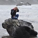 Andrea on a rock in front of our motel