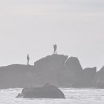 Couple standing on the rocks