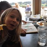 Lexi wielding a tortilla weapon